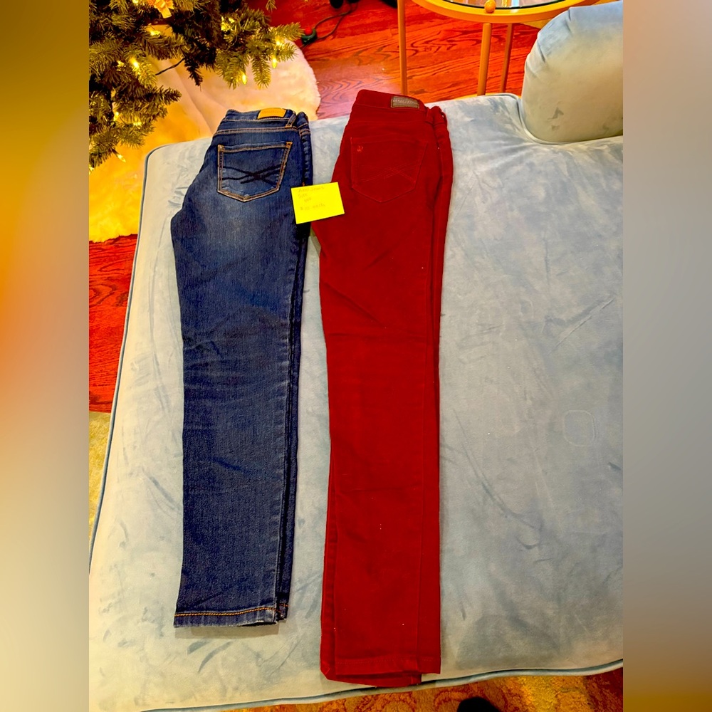 Two pairs of Aero Jeans size 000
